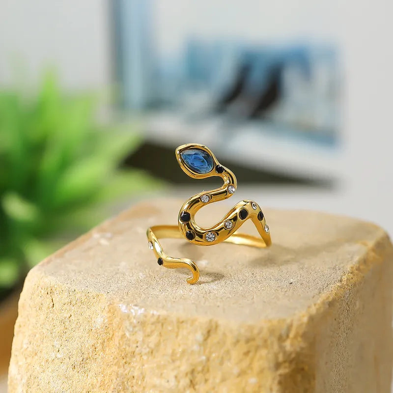 ANILLO DE SERPIENTE CON ZIRCONES MULTICOLOR DORADO
