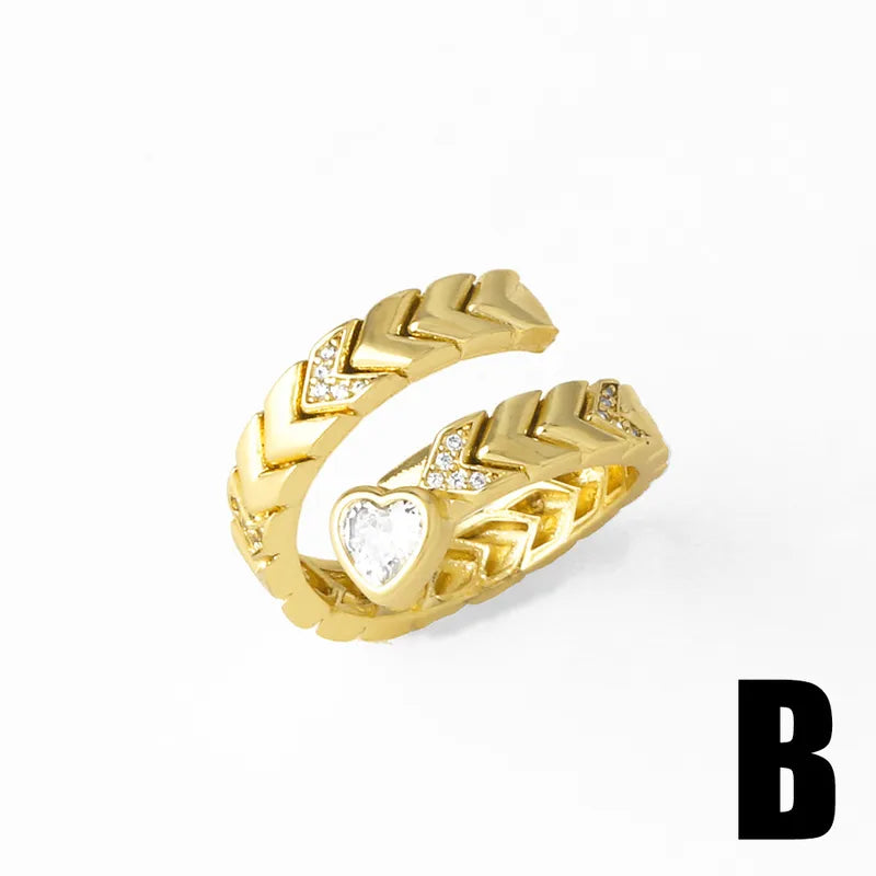 ANILLO TEXTURA DORADO CON ZIRCON CORAZON