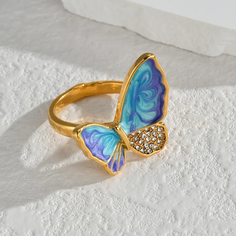 ANILLO AZUL CON MORADO MARIPOSA DORADO