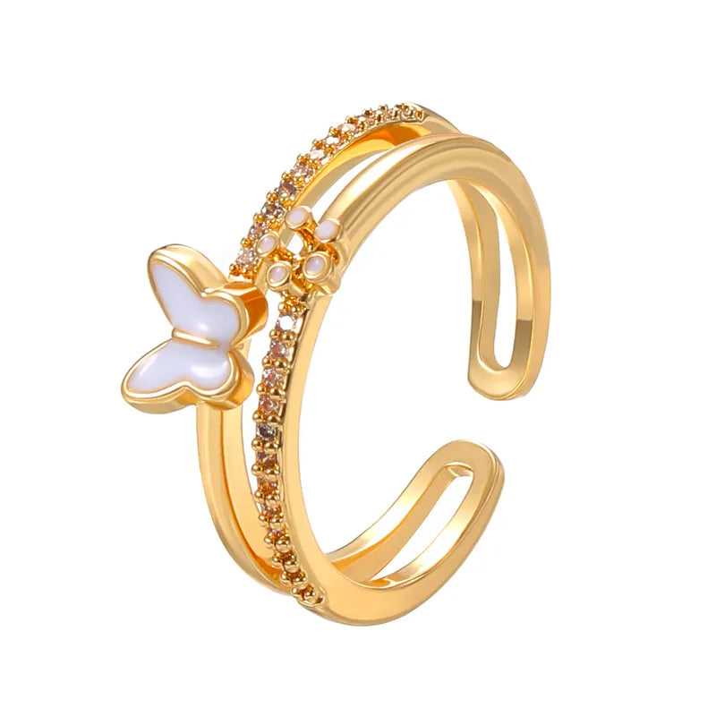 ANILLO MARIPOSA BLANCA CON ZIRCONES DORADO