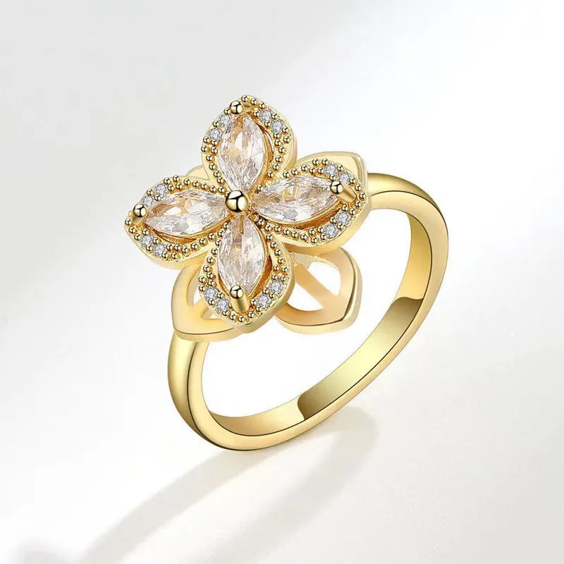 Anillo de flor de zircones