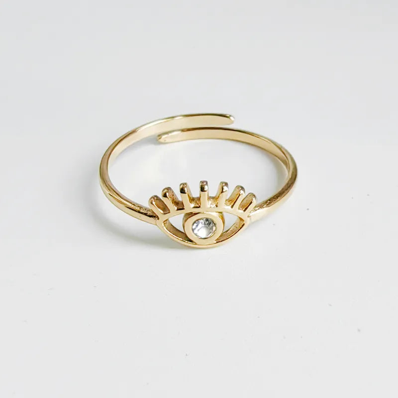 Anillo de ojo turco con zircones dorado