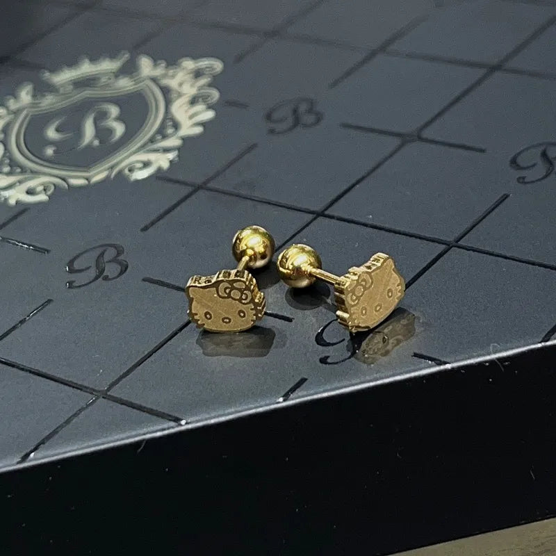 ARETES ORTOPEDICOS DE HELLO KITTY DORADO