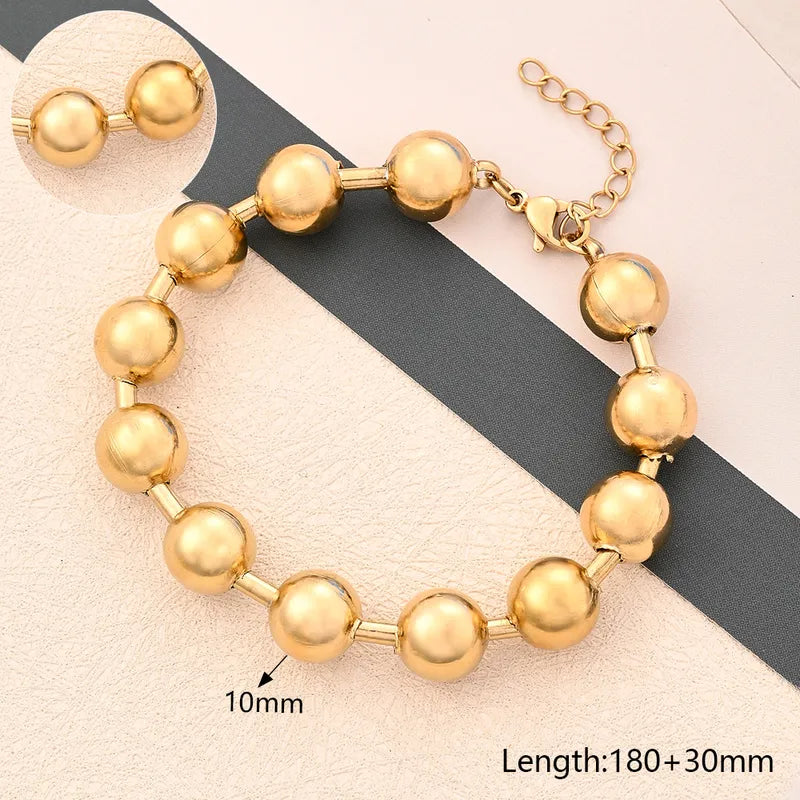 Pulsera balines dorado 10mm
