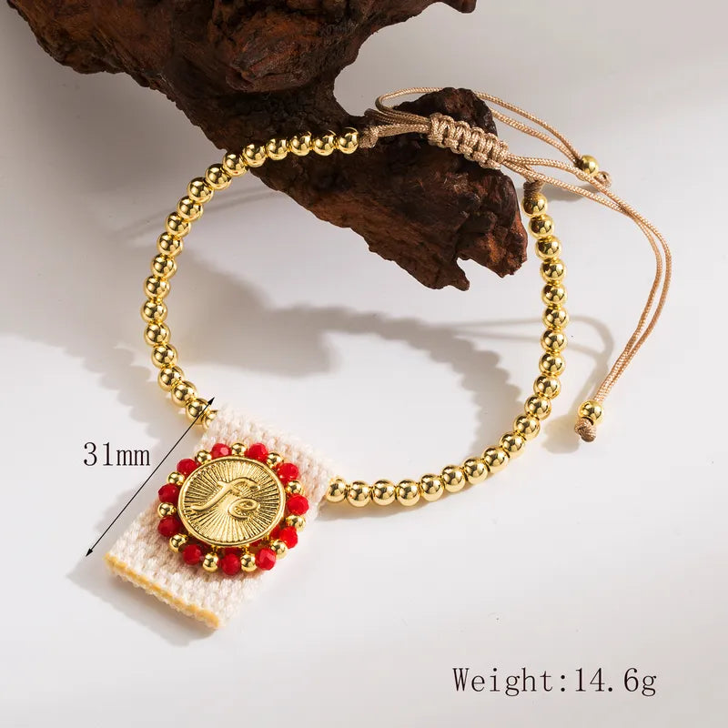 Pulsera de balines fe tejida rojo-dorado