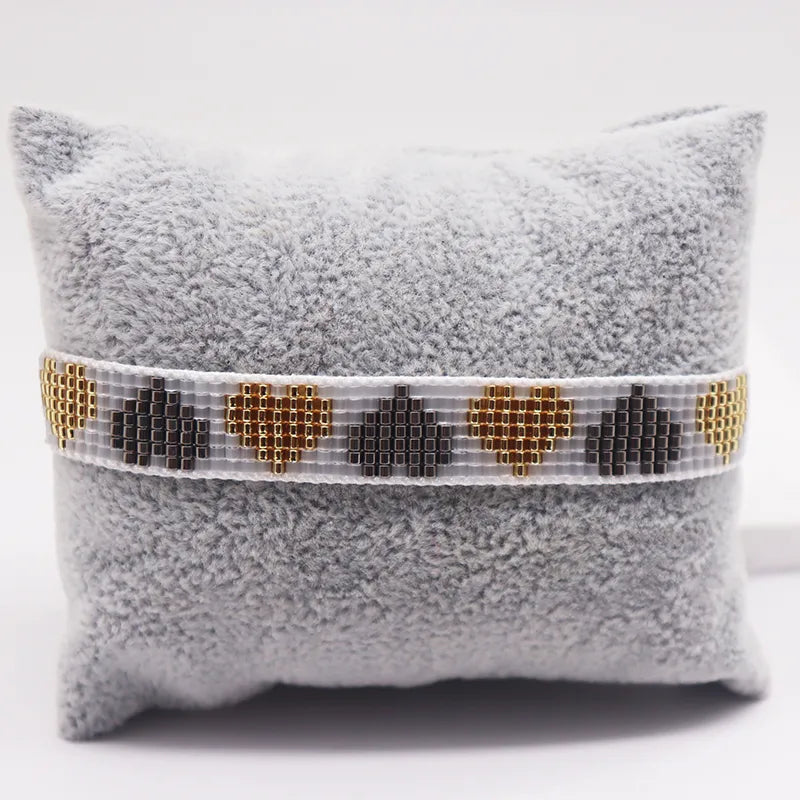 PULSERA TEJIDAS DE CORAZONES AJUSTABLE
