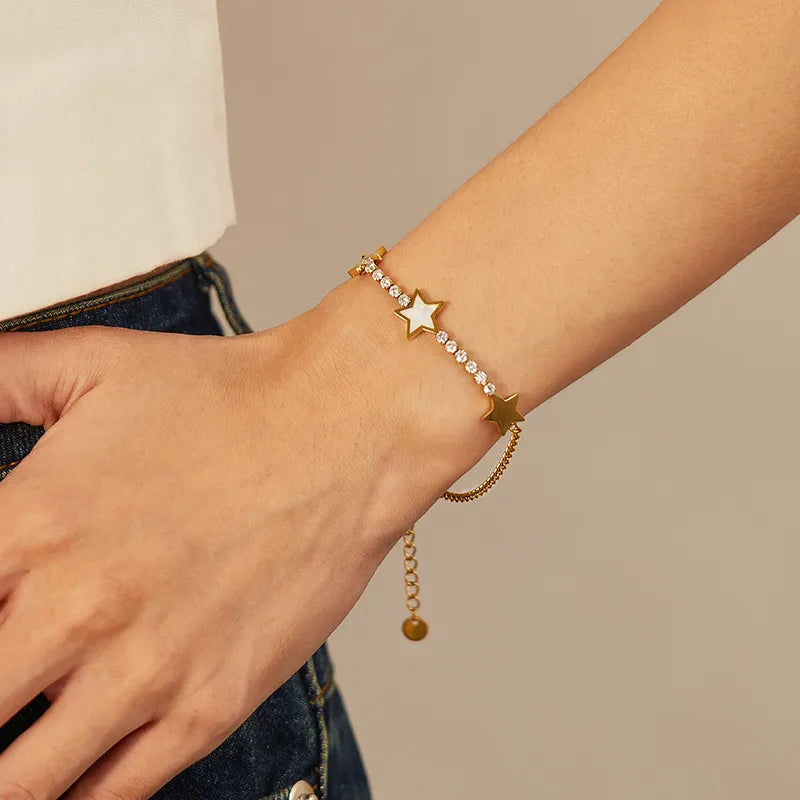 PULSERA ESTRELLAS CON ZIRCONES DORADO
