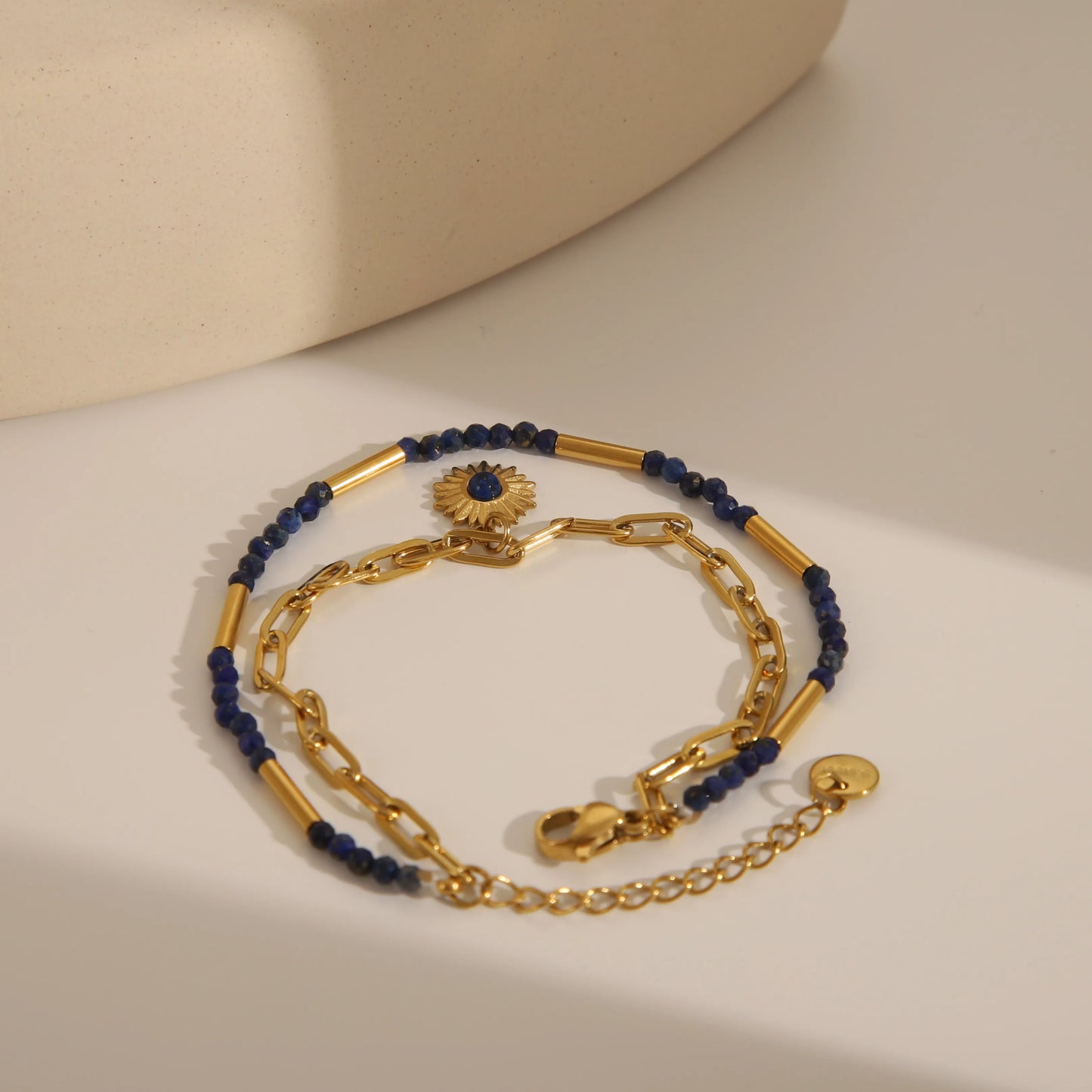 PULSERA DOBLE DE MULLOS AZULES CON DORADO
