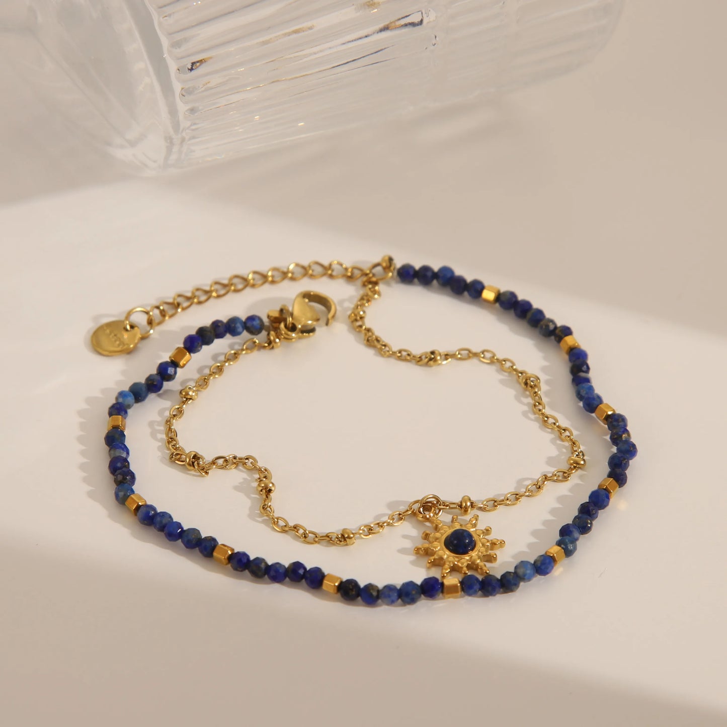 PULSERA DOBLE DE MULLOS AZULES CON DORADO