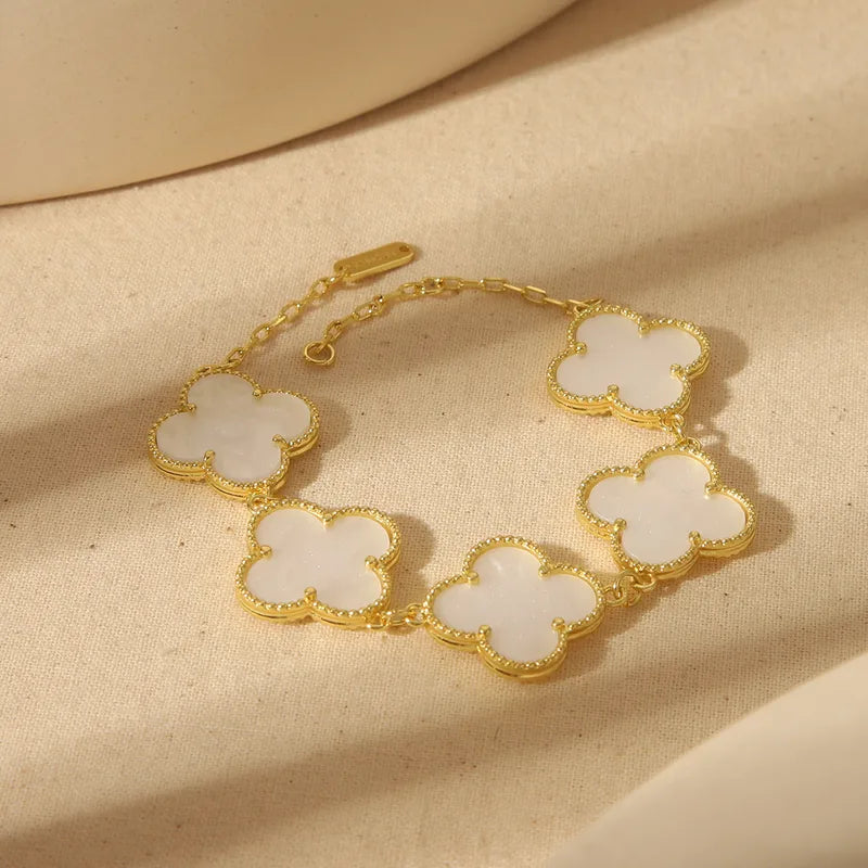 PULSERA TREBOLES GRANDES BLANCO CON DORADO