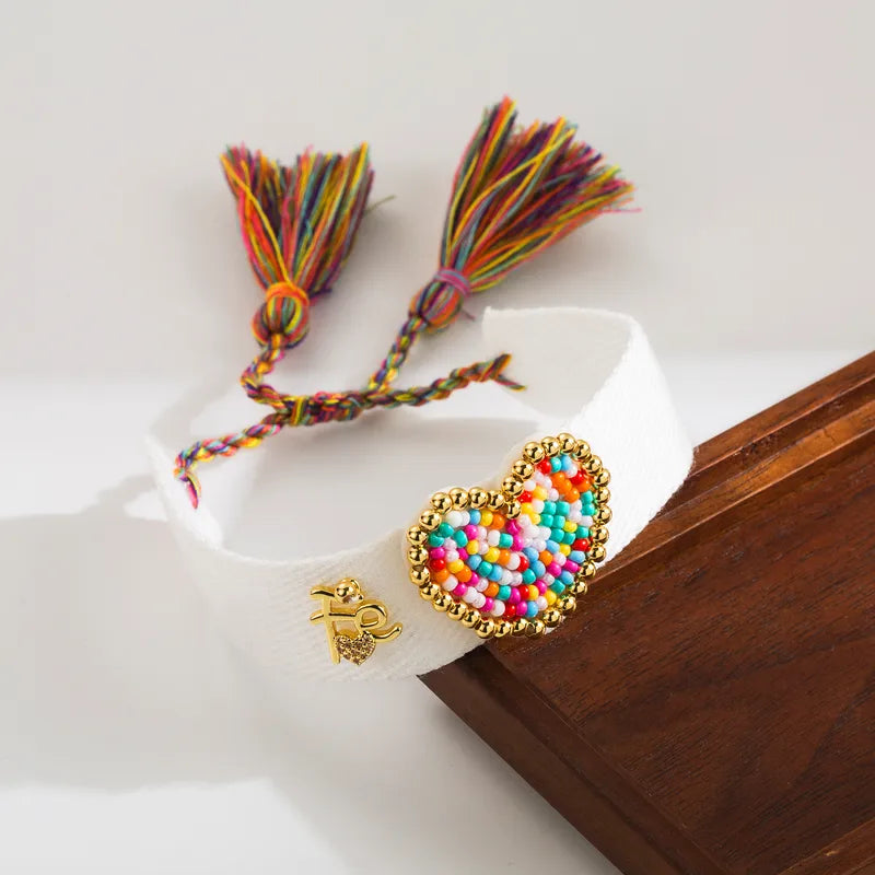 PULSERA DE CORAZON MULTICOLORES AJUSTABLE BLANCO