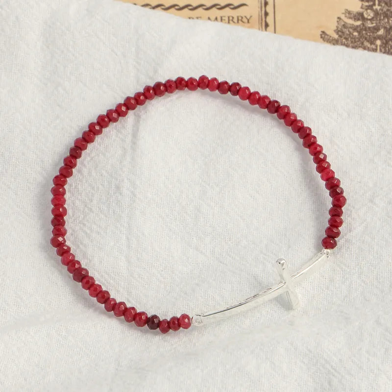 PULSERA CRUZ PIEDRAS ROJAS