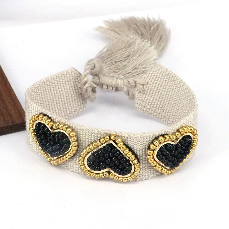 PULSERA 3 CORZONES MULLOS NEGRO BEIGE