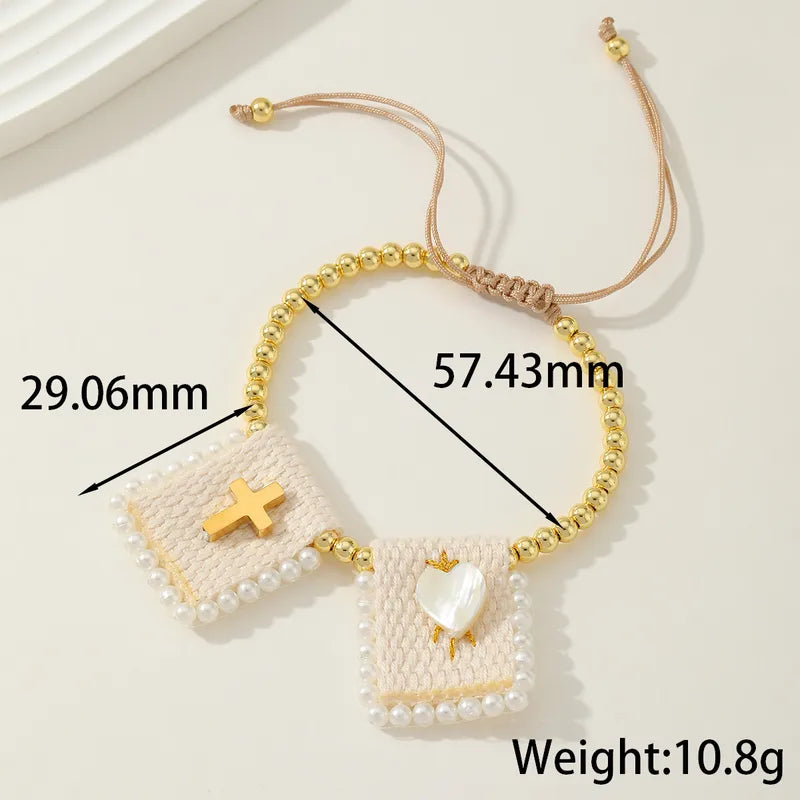 PULSERA BALINES CON CURZ,CORAZON DORADO