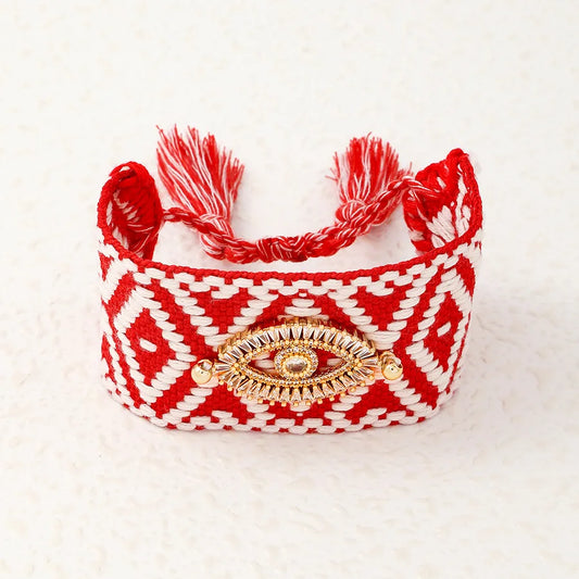 PULSERA TEJIDA CON PATRON ROJO OJO TURCO DORADO