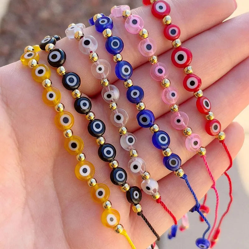 PULSERA OJO TURCO ROJO HILERA CON BALINES DORADO