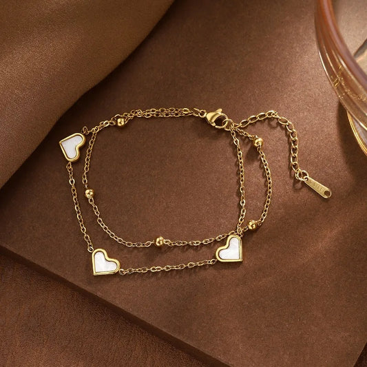 PULSERA DOBLE CON CORAZON BLANCO DORADO