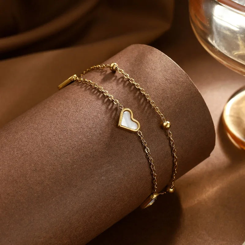PULSERA DOBLE CON CORAZON BLANCO DORADO
