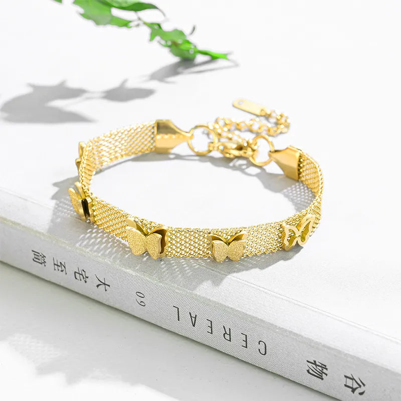 PULSERA DORADA CON MARIPOSAS
