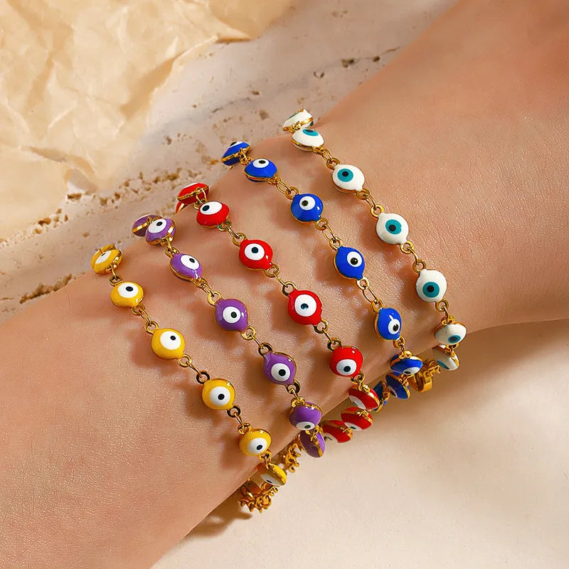 PULSERA HILERA DE OJOS TURCOS ROJO DORADO