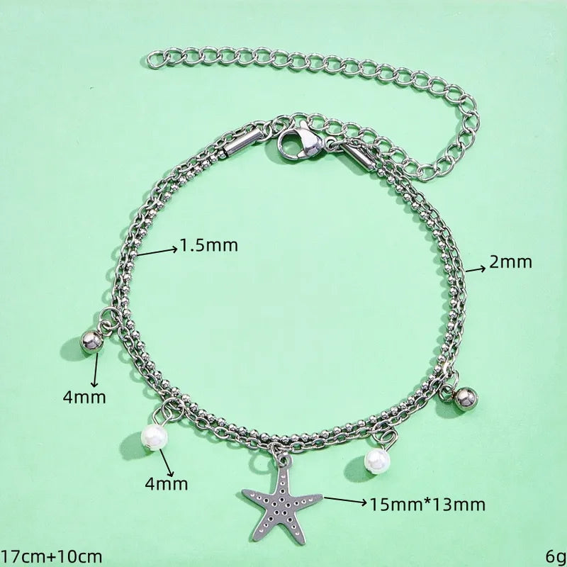 PULSERA DOBLE DE ESTRELLA PLATEADO