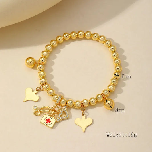 PULSERA BALINES CON DIJES DE MEDICINA DORADO