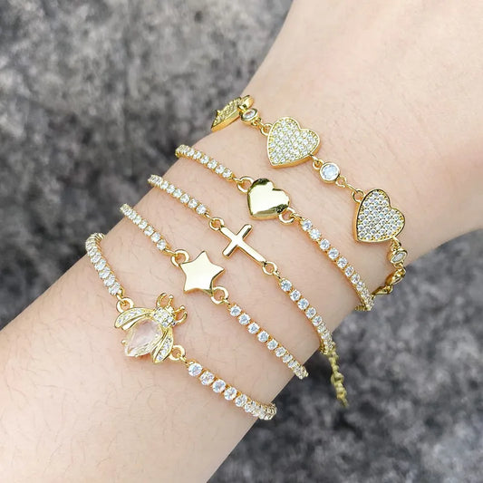 PULSERA DE ZIRCONES CON CRUZ AJUSTABLE DORADO