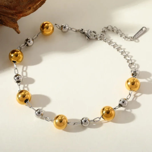 PULSERA BALINES DORADO PLATEADO