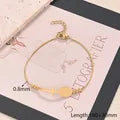PULSERA AJUSTABLE DE VIRGEN BALINES DORADO