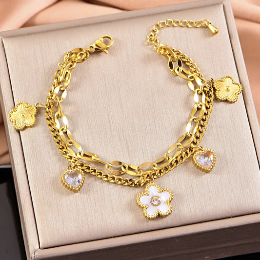 PULSERA DOBLE DIJE DE FLORES Y CORAZONES