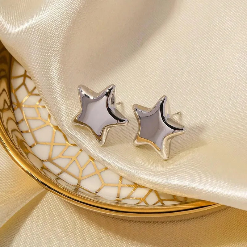 Aretes chunky estrella plateada