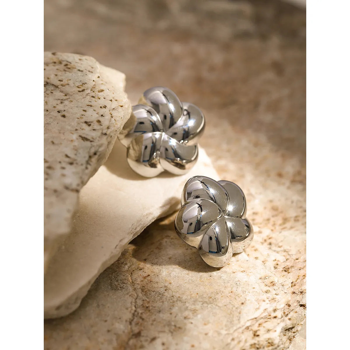 Aretes flores chunky plateado