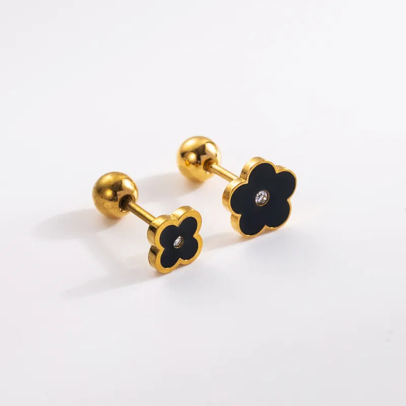 Aretes de flor negro ortopedicos