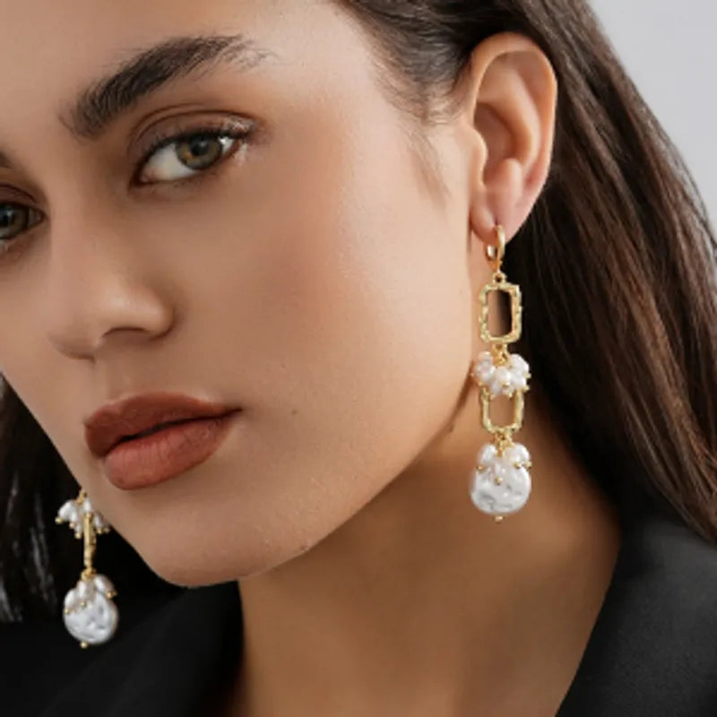 Aretes de perla colgante