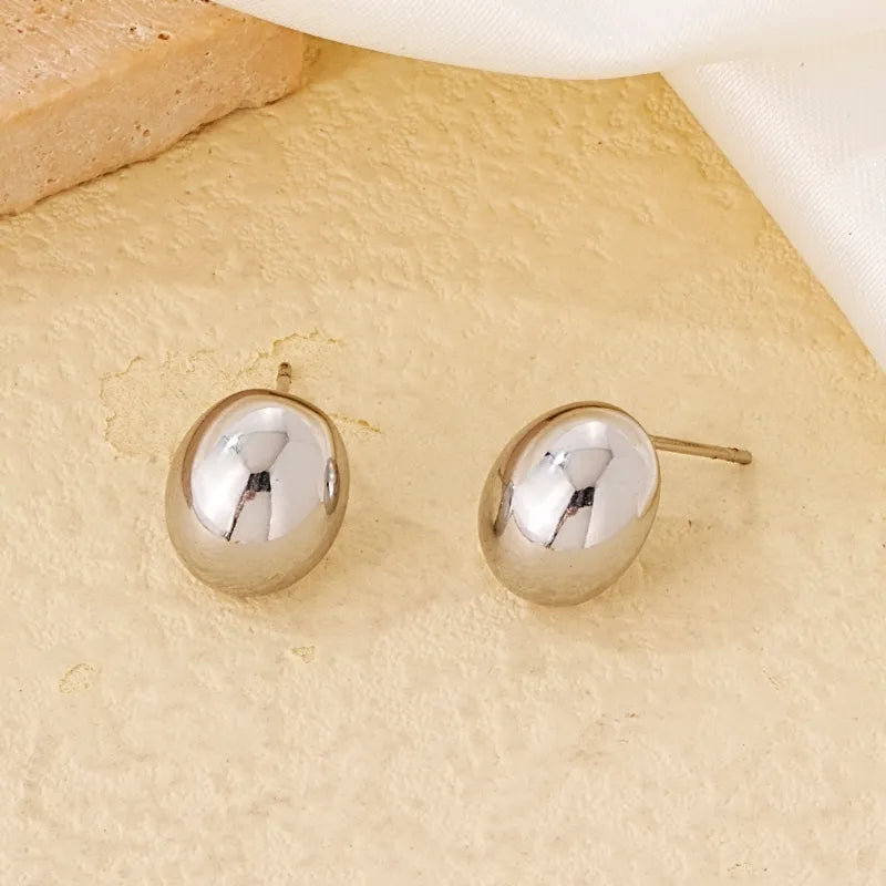 Aretes bolas plateadas