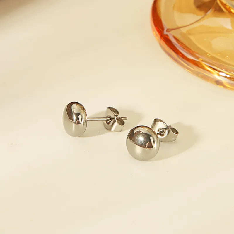 Aretes mini tachuelas plateado