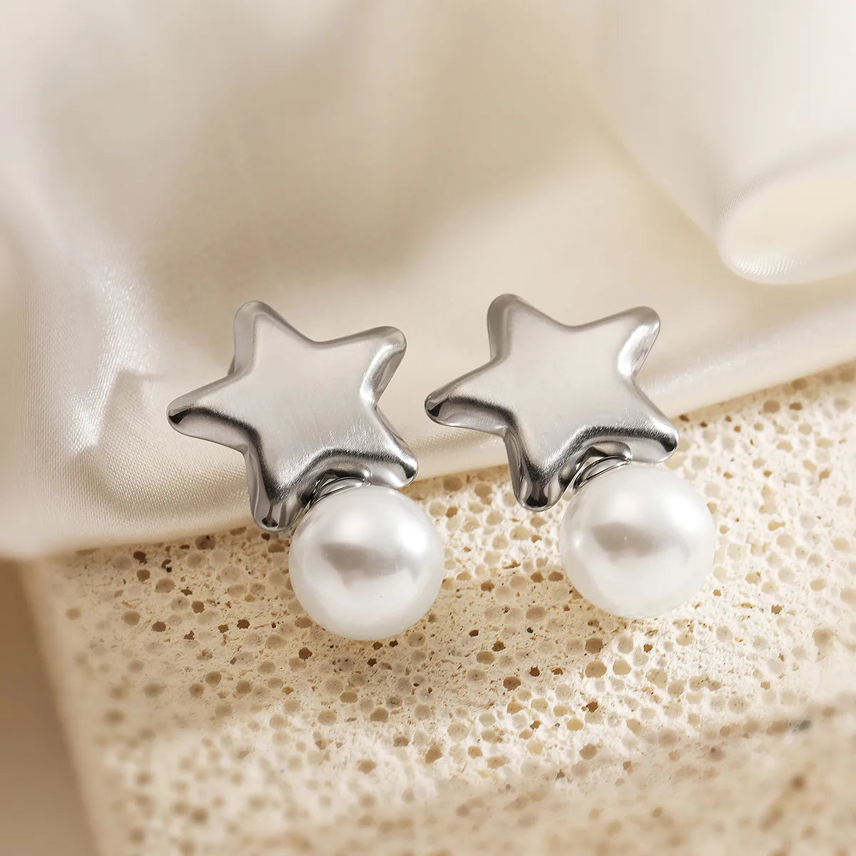ARETES DE ESTRELLA PERLA PLATEADO