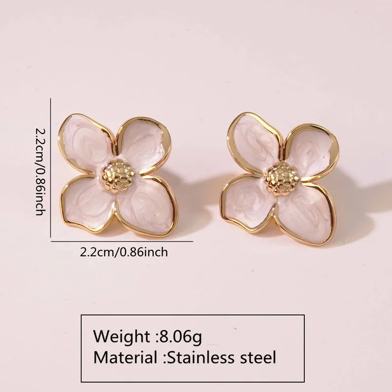ARETES DE FLOR BLANCO-DORADO