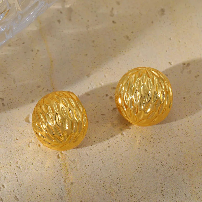 ARETES BOTONES CON TEXTURA DORADO