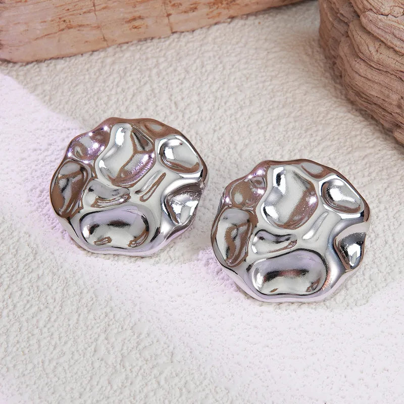 ARETES BOTONES TEXTURS PLATEADO