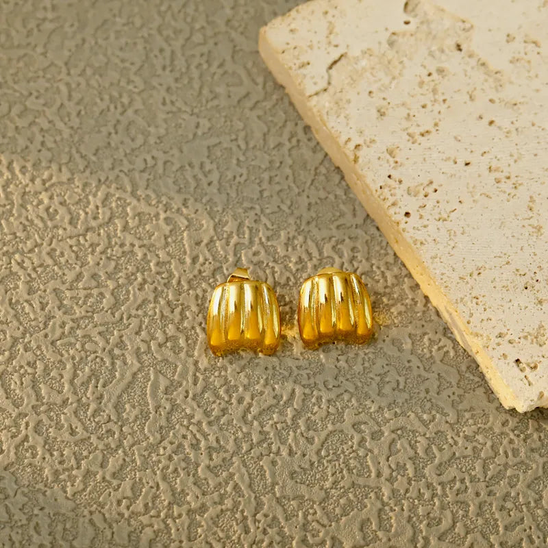 ARETES SEMI BOTONES CON TEXTURA