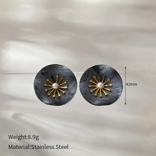 ARETES FLOR CARBON DORADO