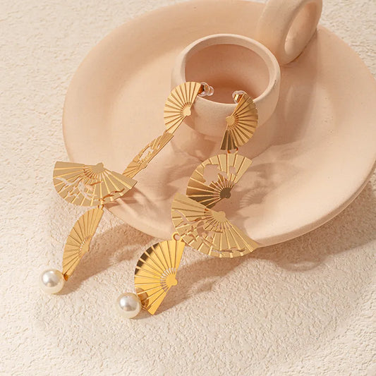 ARETES COLGNATES DE ABANICO