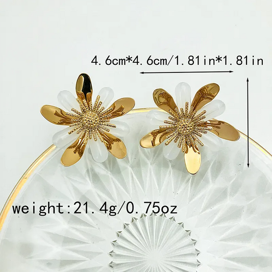 ARETES DE FLOR DORADOS