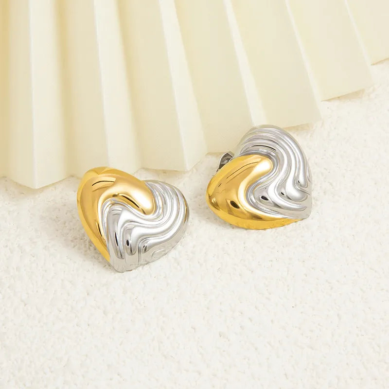 ARETES DE CORAZON DORADO Y PLATEADO