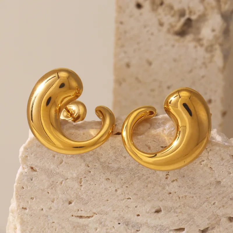 ARETES TIPO COMA DORADO