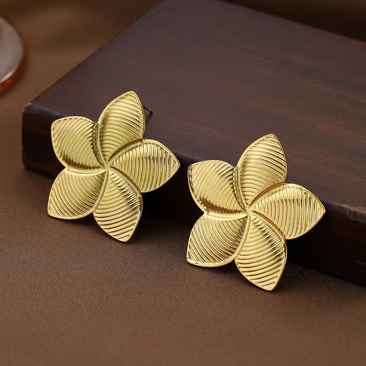 ARETES DISEÑO DE FLOR TEXTURA