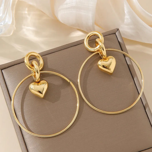 ARETES COLGANTES CON CORAZON