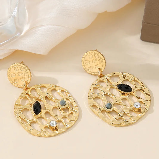 ARETES COLGANTES REDONDOS ELEGANTES CON DISEÑO