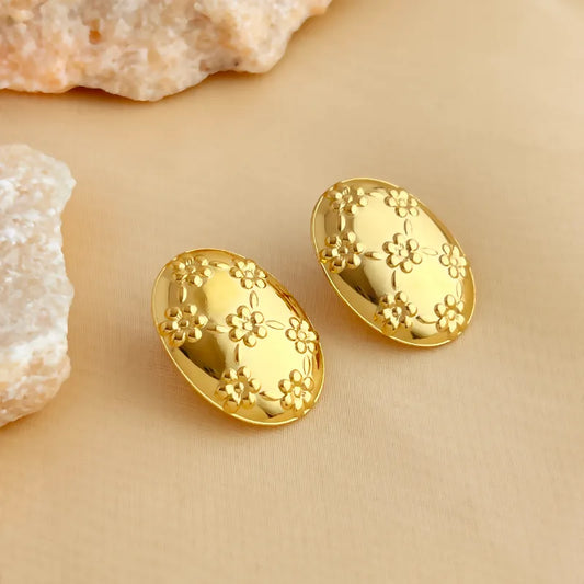 ARETES OVALOS CON DISEÑO DE FLORES